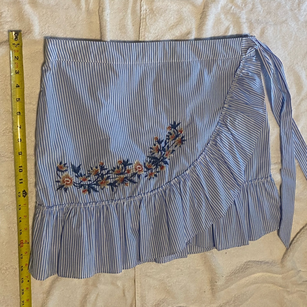 Socialite white and light blue stripped skirt with embroidery and ruffles
